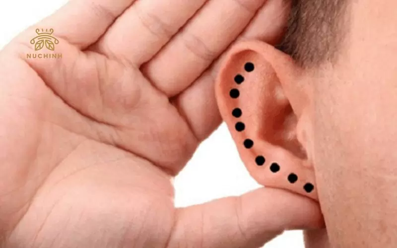 nốt ruồi vành tai phải nam