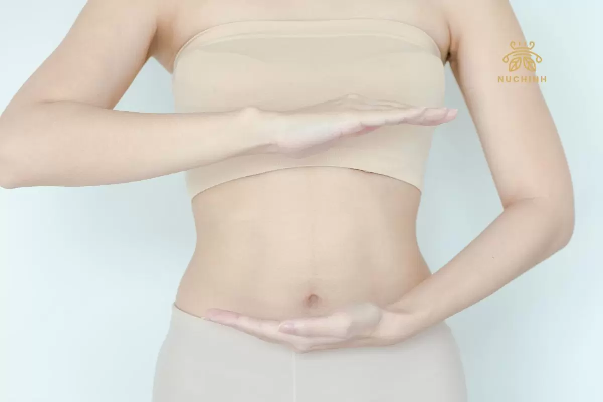 nốt ruồi ở bụng dưới phụ nữ